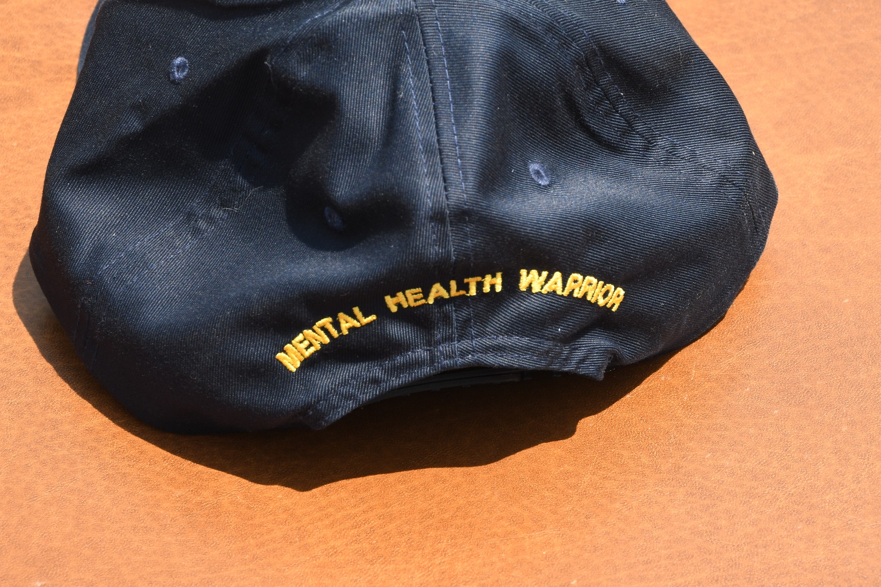Mental Health Warrior navy baseball cap, back view