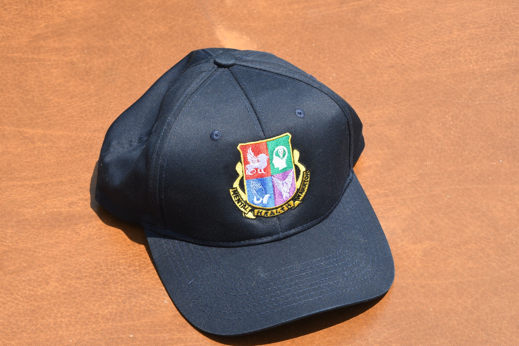 Mental Health Warrior navy baseball cap, front view