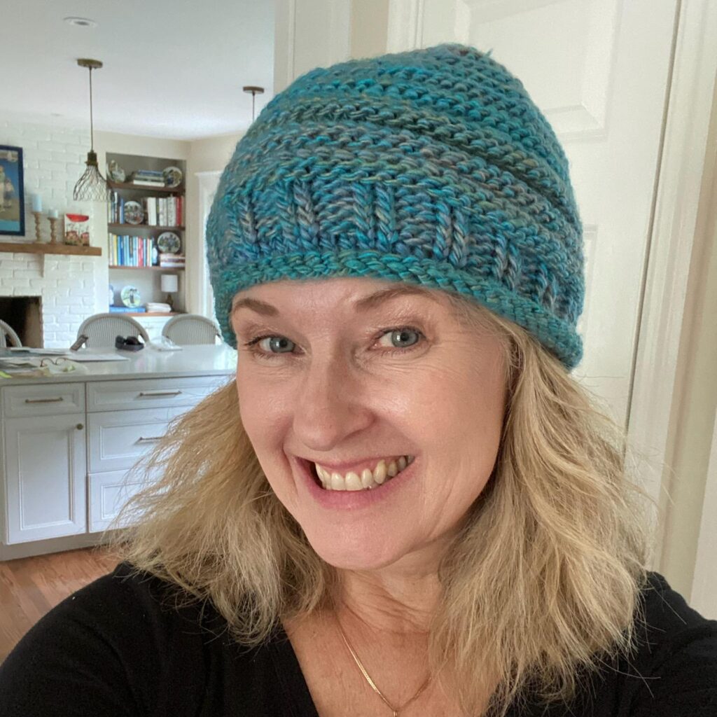 Woman wearing knit hat from MentalHealthWarrior.Life
