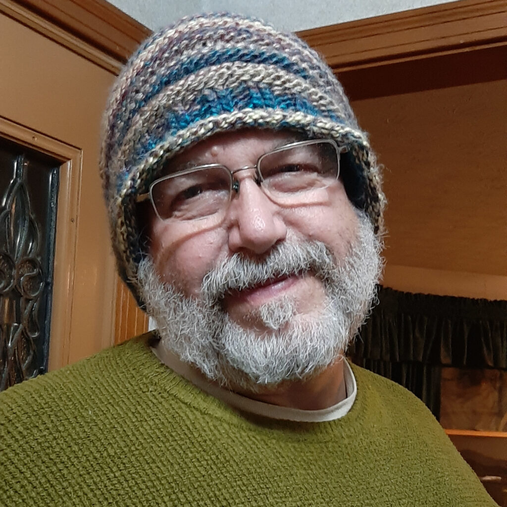 Man wearing knit hat from MentalHealthWarrior.Life